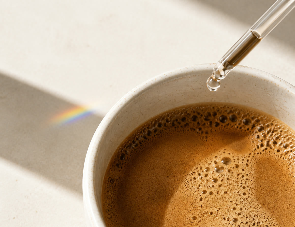 A drop falling into fresh coffee